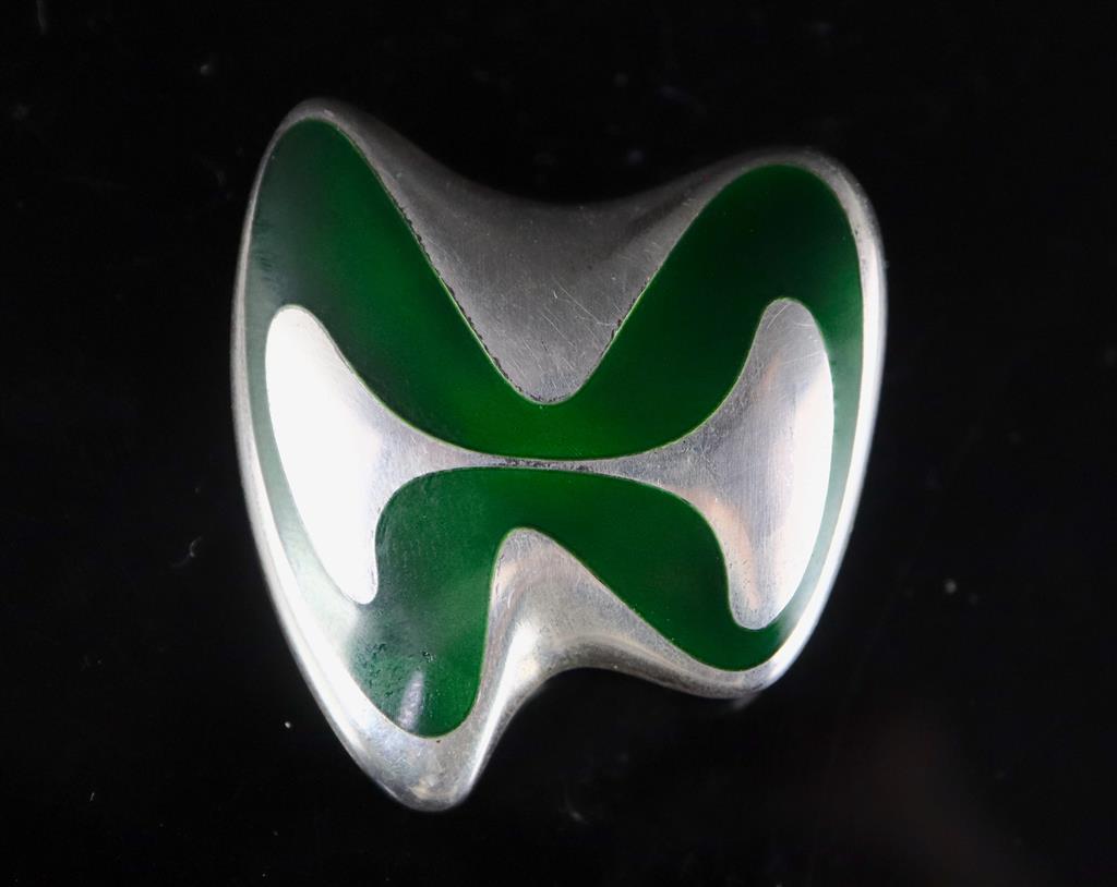 A late 1960s Danish Georg Jensen silver and green enamel abstract brooch, designed by Henning Koppel, design no. 315,